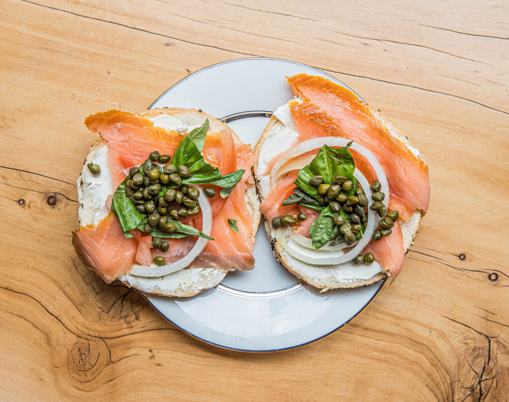 The texture of capers and onion on a bagel with lox photographed by San Diego Food Photographer Nancy Ingersoll